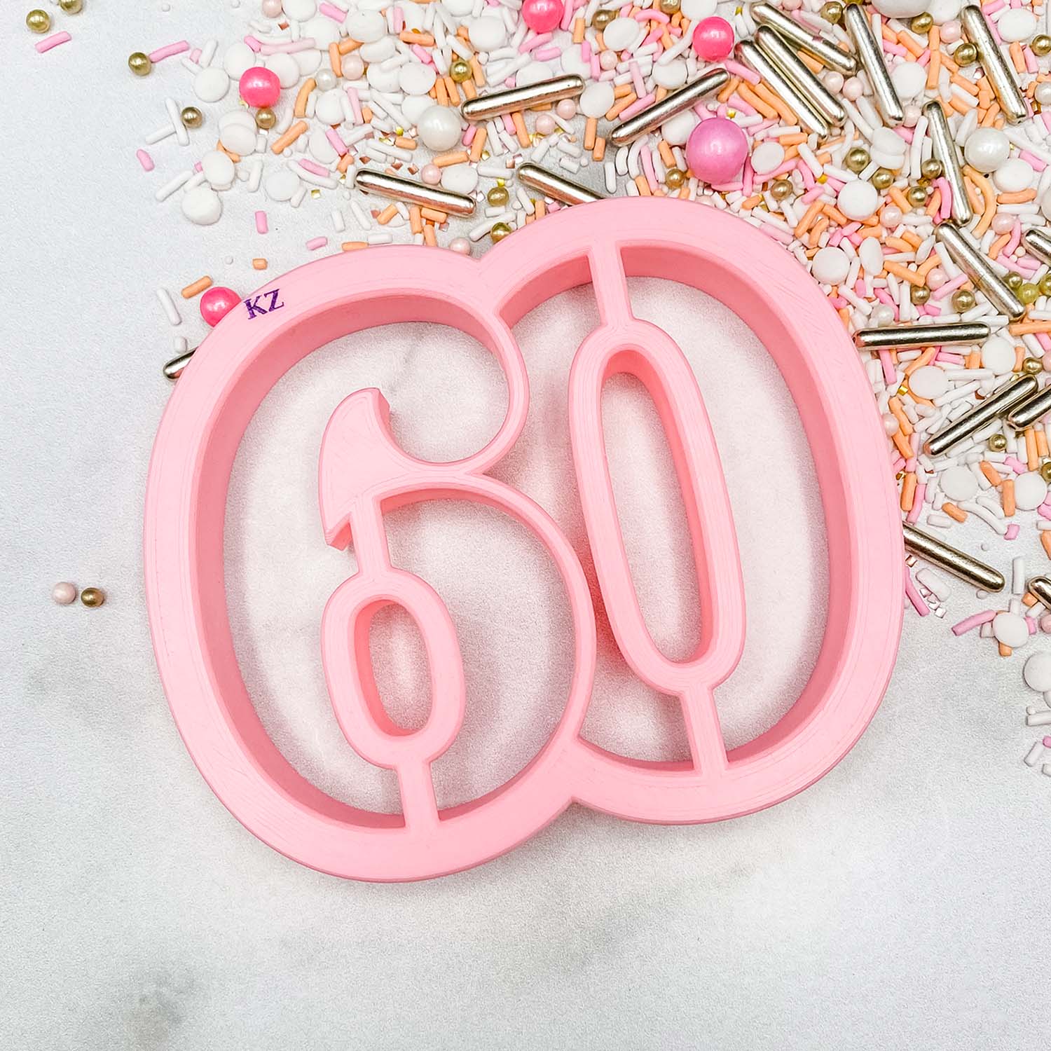 cookie cutter in the shape of the number 60