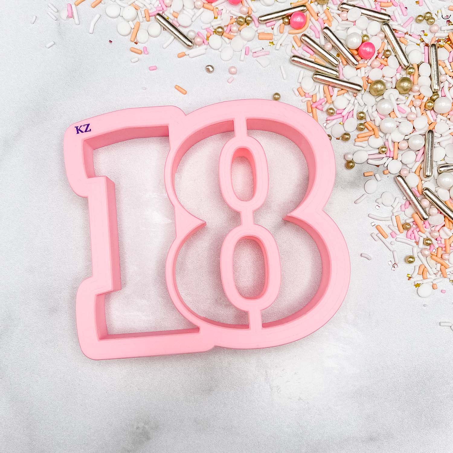 cookie cutter in the shape of the number 18