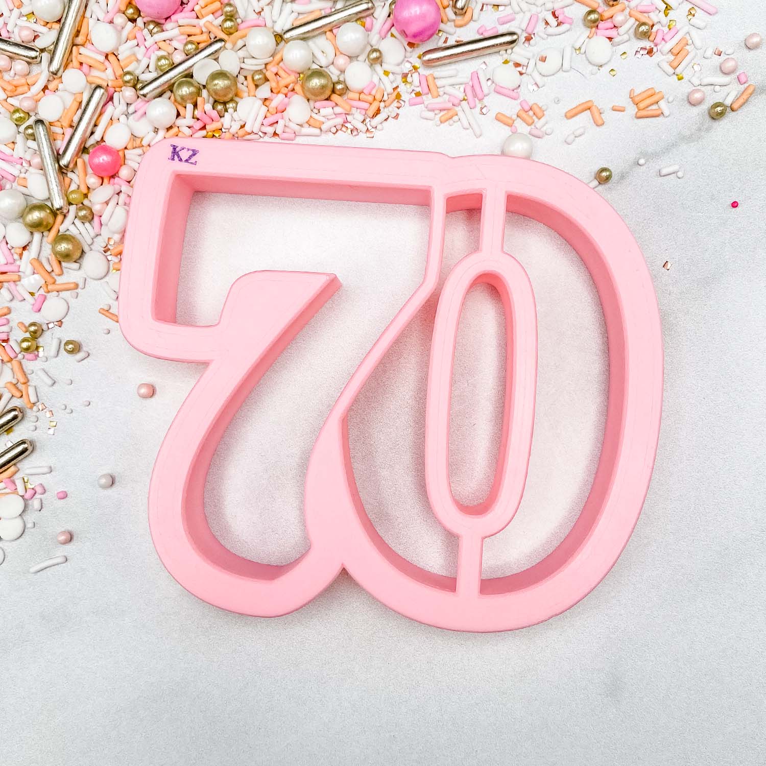 cookie cutter in the shape of the number 70