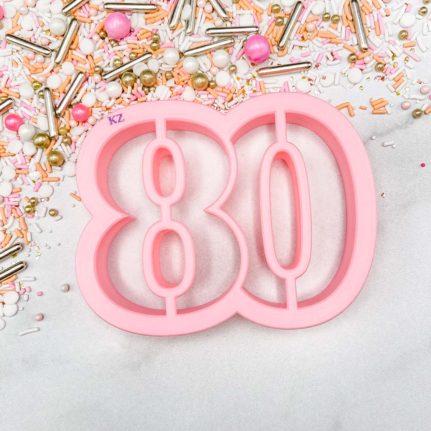 cookie cutter in the shape of the number 80