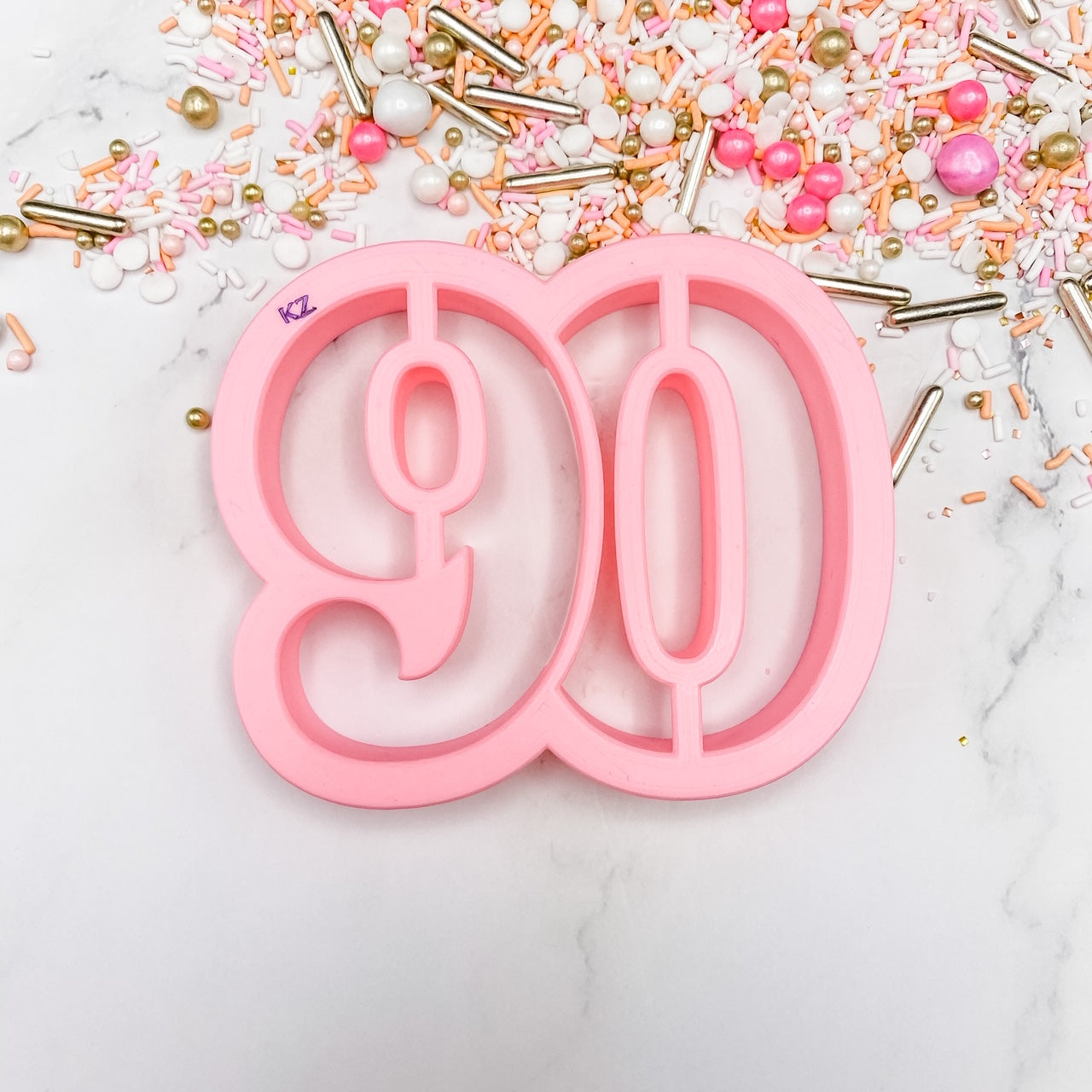 cookie cutter in the shape of the number 90