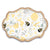 Cookie stencil. The pattern is bees mixed with flowers, honeycomb, and beehives