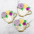 Cookie cutter in the shape of a teacup with flowers in it